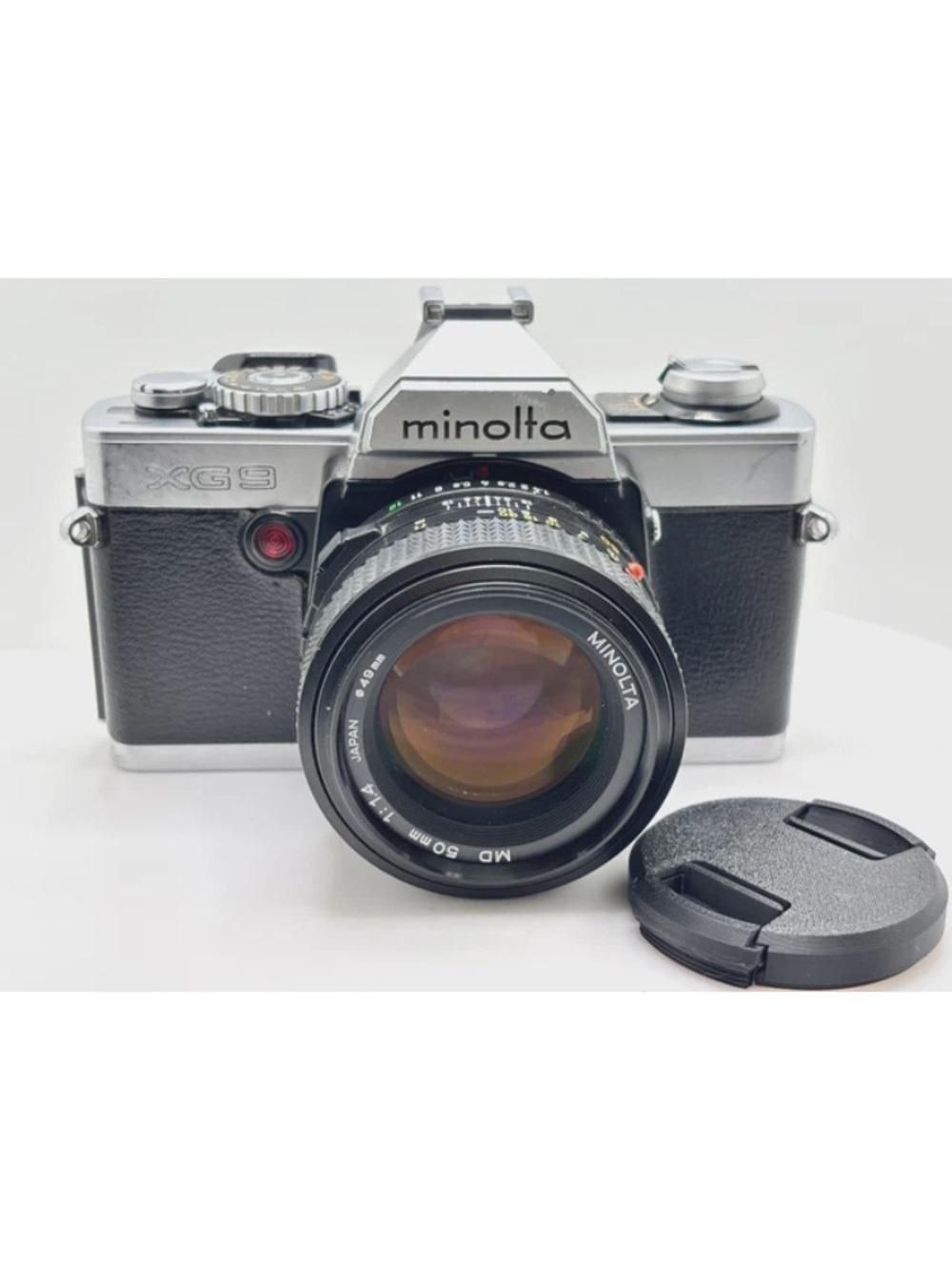 Minolta XG9 35mm Film Camera with Black and Silver Body